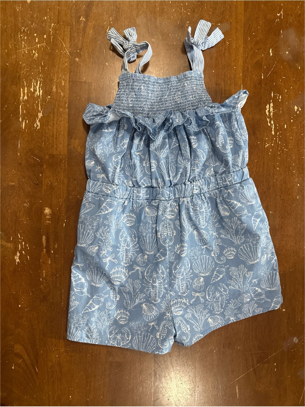 Shop the Mint Blue Cotton Shell-Print Smocked Girls' One-Piece Romper